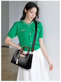 Elegant Women's Handbag Unique Handle Design Featuring a Stylish Pattern Spacious Interior  Adjustable Strap Functionality